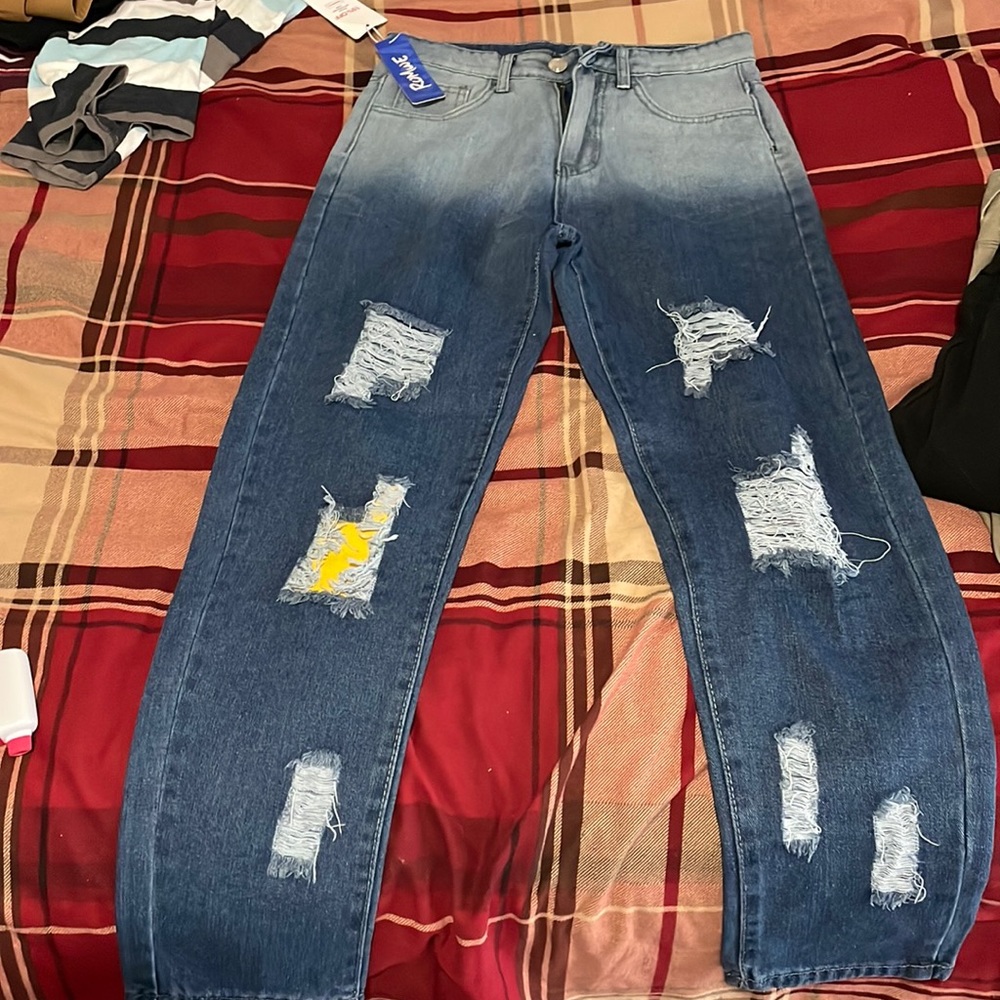 These are ripped jeans !! They are Romwe brand !!